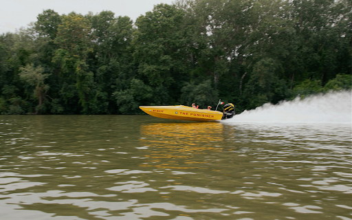 A yellow speed boat is speeding through the water  from Chrome web store to be run with OffiDocs Chromium online