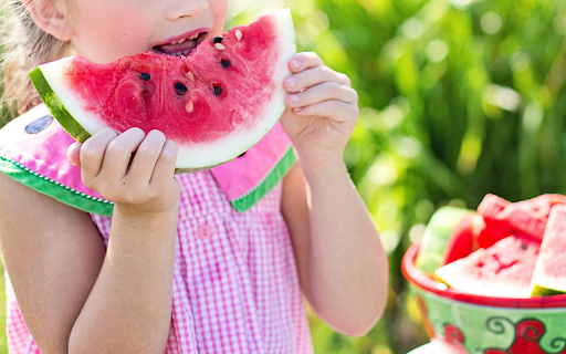 Baby tries watermelon  from Chrome web store to be run with OffiDocs Chromium online