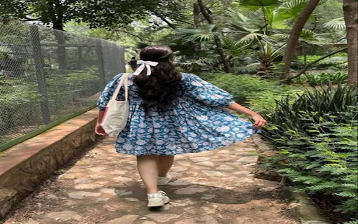background shot of girl in floral dress  from Chrome web store to be run with OffiDocs Chromium online