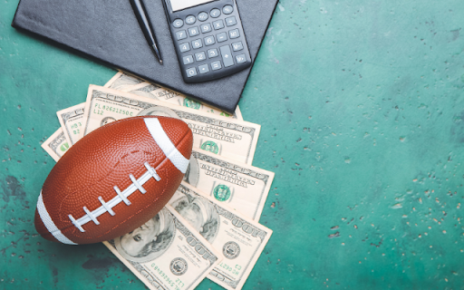Ball Resting on 100 Dollar Bills  from Chrome web store to be run with OffiDocs Chromium online