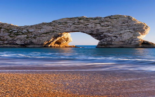 beach wallpaper with stone arches  from Chrome web store to be run with OffiDocs Chromium online