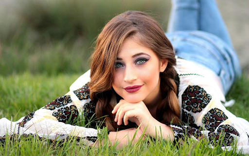 Beautiful girl lying on the grass  from Chrome web store to be run with OffiDocs Chromium online
