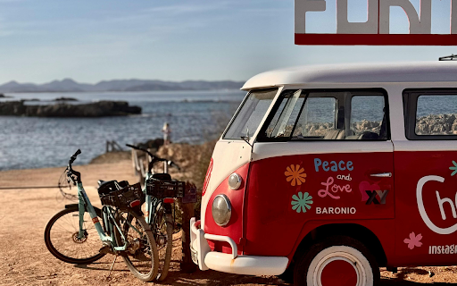 Bicycles and an Old Volkswagen Station Wagon by the Sea  from Chrome web store to be run with OffiDocs Chromium online