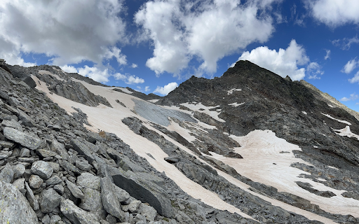 Blue clouds and gray green rocks  from Chrome web store to be run with OffiDocs Chromium online