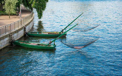 Blue fishing boat  from Chrome web store to be run with OffiDocs Chromium online