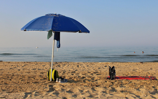 Blue umbrella on the sea  from Chrome web store to be run with OffiDocs Chromium online