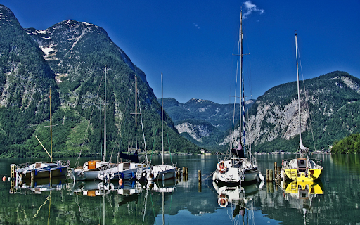Boats on the mountain lake  from Chrome web store to be run with OffiDocs Chromium online