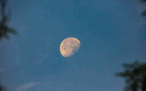 Bright Moon in Blue Skies  from Chrome web store to be run with OffiDocs Chromium online