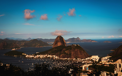 Brown Mountain Surrounded with White Buildings  from Chrome web store to be run with OffiDocs Chromium online