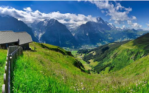 Building on Green Hill Near Rocky Mountains  from Chrome web store to be run with OffiDocs Chromium online