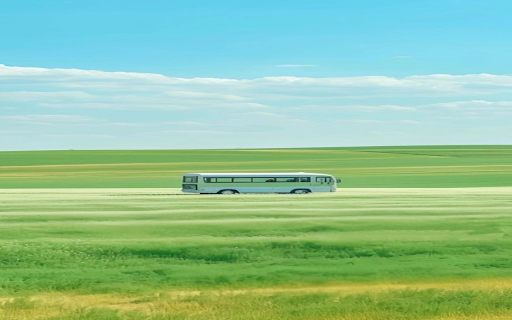Bus traveling in a field Wallpaper  from Chrome web store to be run with OffiDocs Chromium online