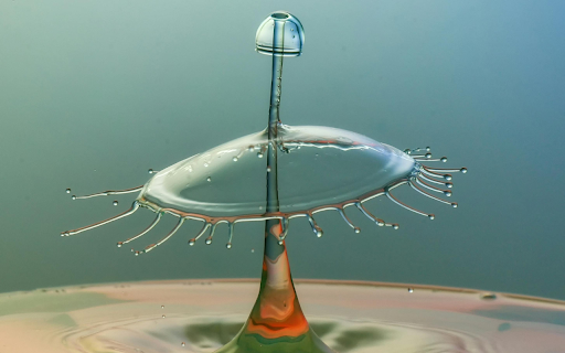 Captivating Water Droplet Collision Art  from Chrome web store to be run with OffiDocs Chromium online