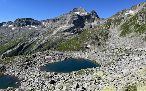 Clear puddle on rocky mountain  from Chrome web store to be run with OffiDocs Chromium online