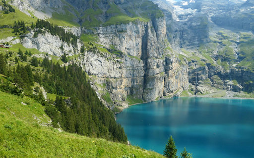 Cliffside by Lake Oeschinen in Switzerland  from Chrome web store to be run with OffiDocs Chromium online
