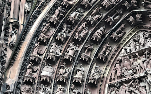 Close up of the Tympanum of the Strasbourg Cathedral  from Chrome web store to be run with OffiDocs Chromium online