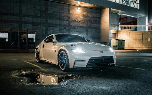 Close Up Photo Of White Sports Car  from Chrome web store to be run with OffiDocs Chromium online