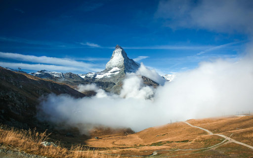 Cloud over a Valley and the Matterhorn Mountain  from Chrome web store to be run with OffiDocs Chromium online