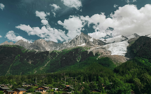 Clouds above Village in Mountain Valley  from Chrome web store to be run with OffiDocs Chromium online