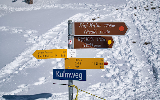 Directional Signages on Snowy Rigi Kulm Trail  from Chrome web store to be run with OffiDocs Chromium online