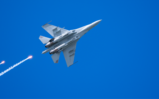 Fighter Jet Launching Flares  from Chrome web store to be run with OffiDocs Chromium online