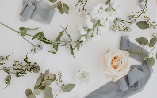 Flowers and branches with ribbon in floral workshop  from Chrome web store to be run with OffiDocs Chromium online