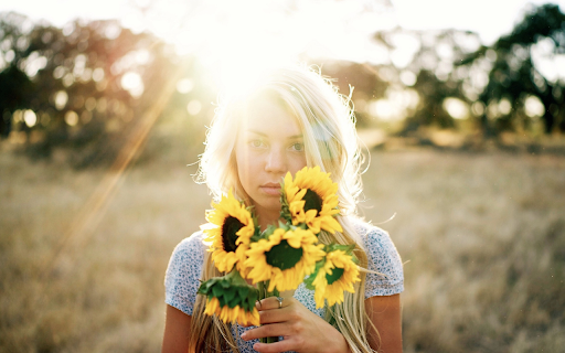 Girl holding a bouquet of flowers  from Chrome web store to be run with OffiDocs Chromium online