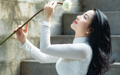 Girl holding a flower  from Chrome web store to be run with OffiDocs Chromium online