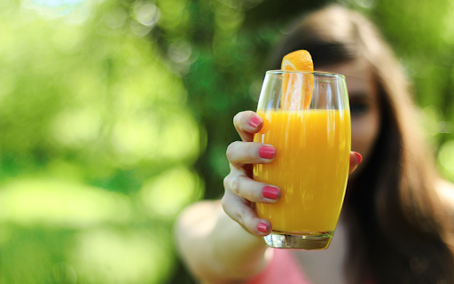 Girl holding a fruit cup  from Chrome web store to be run with OffiDocs Chromium online