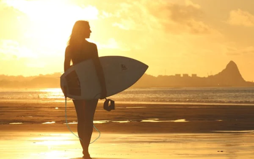 Girl hugging surfboard  from Chrome web store to be run with OffiDocs Chromium online