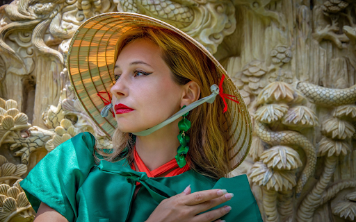 Girl in green dress and conical hat  from Chrome web store to be run with OffiDocs Chromium online