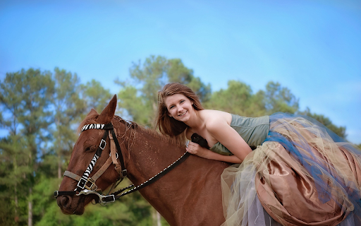 Girl riding a brown horse  from Chrome web store to be run with OffiDocs Chromium online