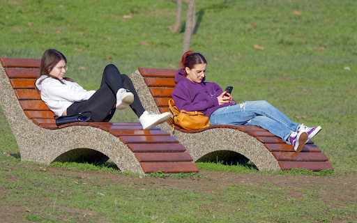 girls on park benches  from Chrome web store to be run with OffiDocs Chromium online