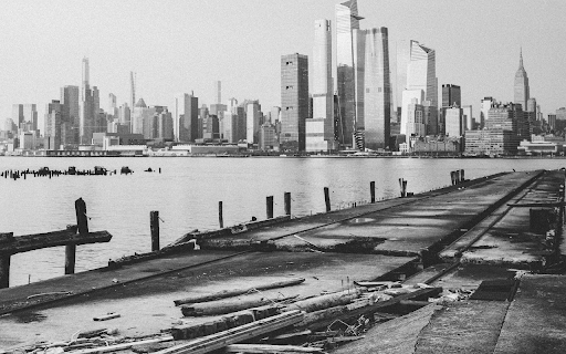 Grayscale Photo of Body of Water Near City Buildings  from Chrome web store to be run with OffiDocs Chromium online
