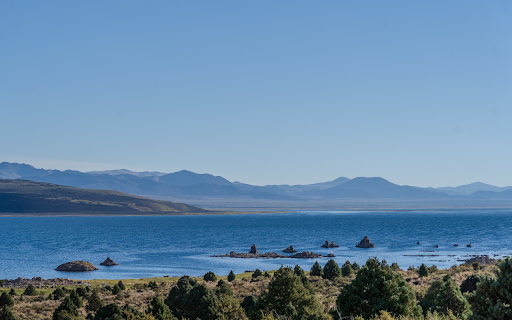 Green lake, mountains and rocks  from Chrome web store to be run with OffiDocs Chromium online