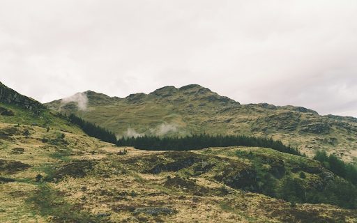 Green mountain under cloudy  from Chrome web store to be run with OffiDocs Chromium online