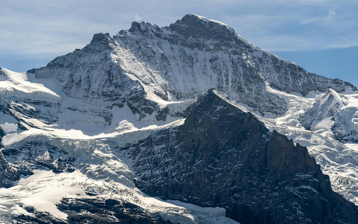 High Mountains Covered in Snow  from Chrome web store to be run with OffiDocs Chromium online