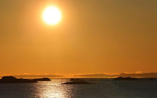 Islands on Body of Water Under Yellow Sky  from Chrome web store to be run with OffiDocs Chromium online