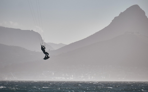 Kitesurfing Over the Waves  from Chrome web store to be run with OffiDocs Chromium online