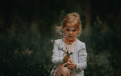 Little girl picking flowers  from Chrome web store to be run with OffiDocs Chromium online