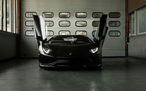Luxury Black Car with Open Doors in Garage  from Chrome web store to be run with OffiDocs Chromium online