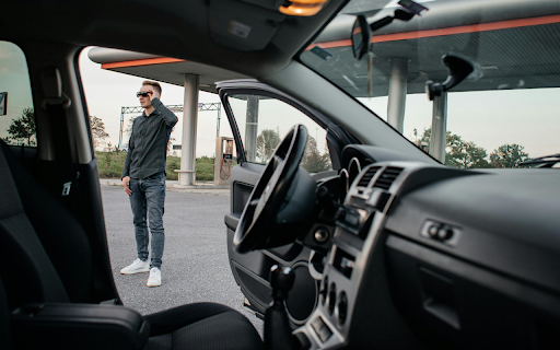 Man and His Car Parked on a Gas Station  from Chrome web store to be run with OffiDocs Chromium online