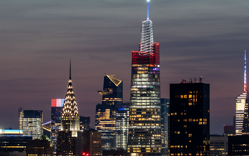 Manhattan Lit Up with Festive Colors  from Chrome web store to be run with OffiDocs Chromium online