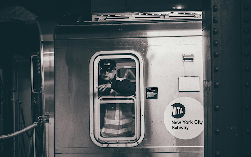 Man Sticking Out His Hand on Train Window  from Chrome web store to be run with OffiDocs Chromium online