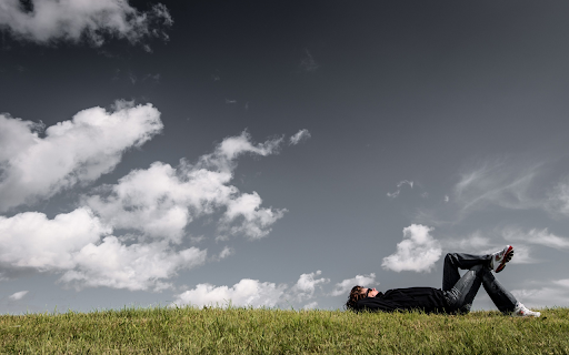 Men sleeping on the grass  from Chrome web store to be run with OffiDocs Chromium online