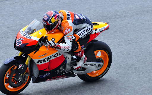 MotoGP Machine: A Symphony of Speed and Precision  from Chrome web store to be run with OffiDocs Chromium online