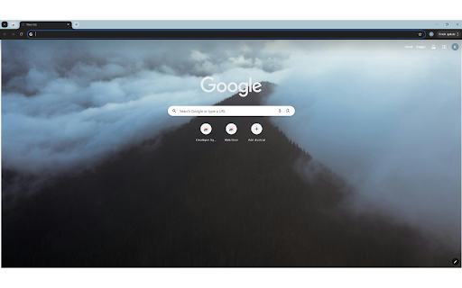 Mountain peak covered with forest in fog  from Chrome web store to be run with OffiDocs Chromium online