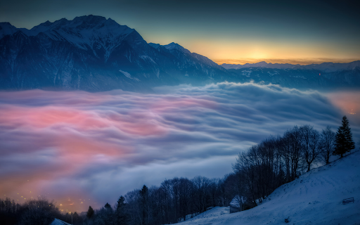 Mystical Fog Over Snowy Mountains at Sunset  from Chrome web store to be run with OffiDocs Chromium online