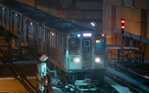 Night Photography of a Train in Chicago  from Chrome web store to be run with OffiDocs Chromium online