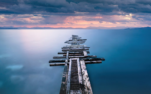Old Wooden Pier Over a Calm Sea  from Chrome web store to be run with OffiDocs Chromium online