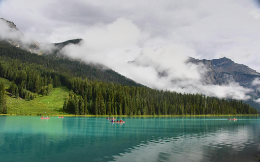 People Riding Boat on Lake  from Chrome web store to be run with OffiDocs Chromium online